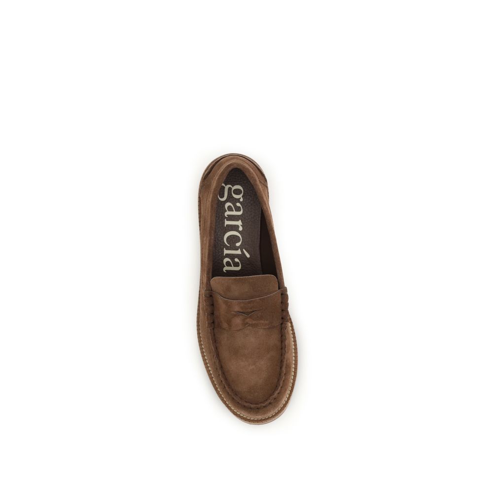 Pedro García brown suede leather slip-on loafers shown from a side angle on a white background.