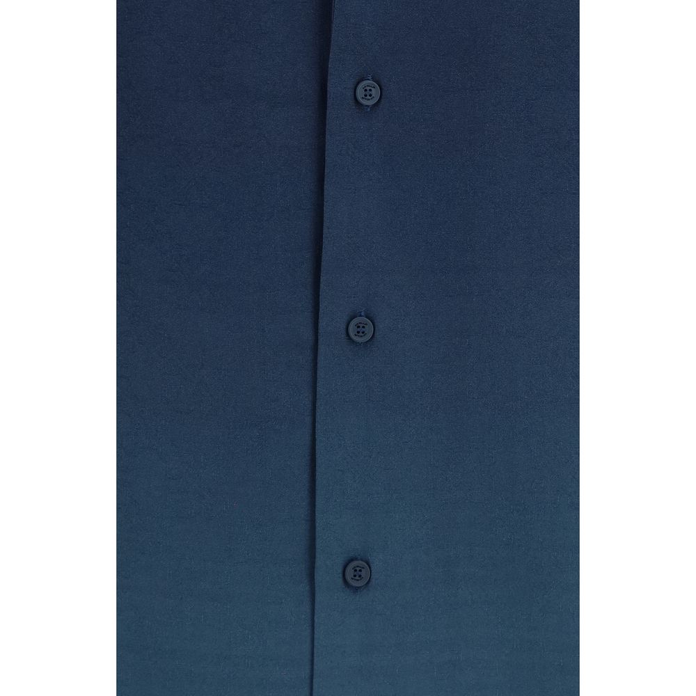 Off-White blue viscose shirt with a patterned design, long sleeves, and a classic collar, displayed on a hanger.