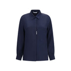 Max Mara blue silk shirt displayed on a hanger, showcasing its smooth fabric and classic collar.
