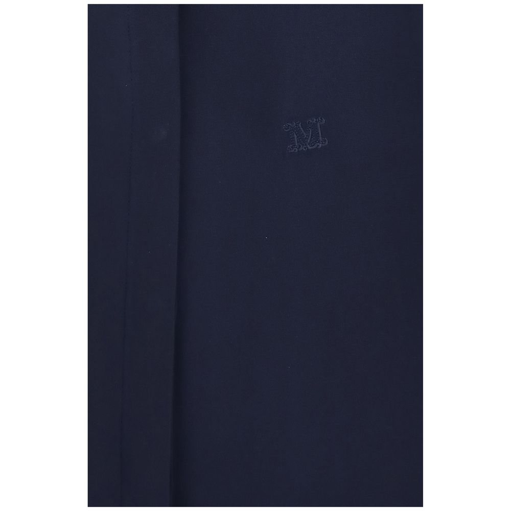Max Mara blue silk shirt displayed flat, showcasing its smooth fabric and classic collar detail.