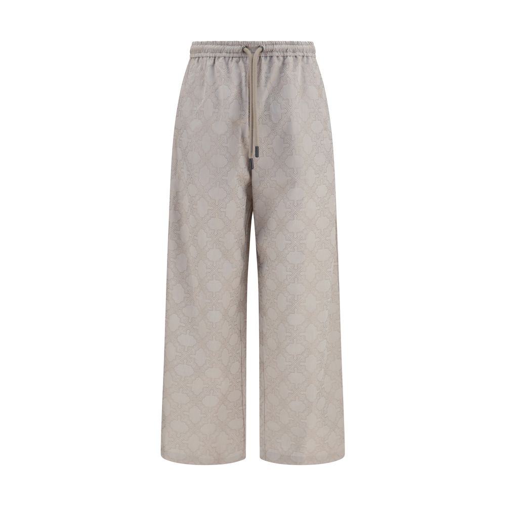 Off-White beige cotton casual pants displayed, featuring relaxed fit and minimalist design for everyday wear.