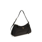 Prada black calf leather Bos Taurus shoulder bag with silver hardware and structured design.