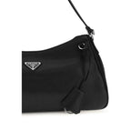 Prada black calf leather Bos Taurus shoulder bag with gold-tone hardware and adjustable strap, stylish and elegant accessory.