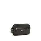 Valentino Garavani black calf leather Bos Taurus shoulder bag with gold-tone hardware and structured design.