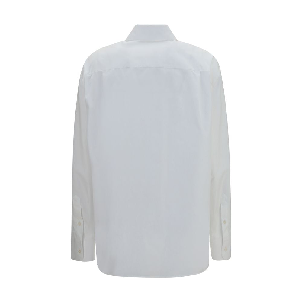 White cotton dress shirt by Dolce & Gabbana, tailored fit with classic collar and button-down front, displayed on a hanger.