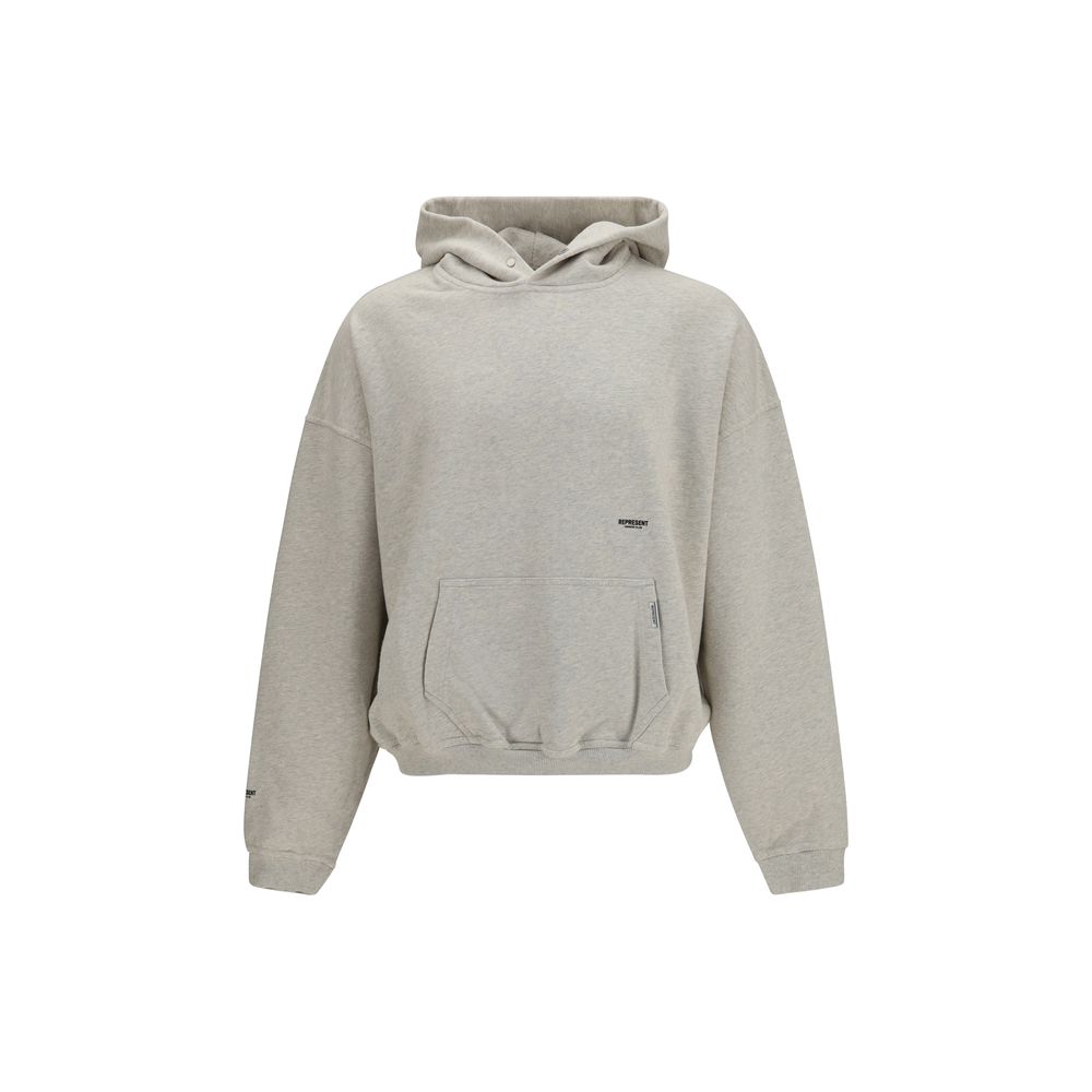 Represent beige cotton sweatshirt displayed flat with visible crew neck and long sleeves, showcasing soft fabric and stylish design.