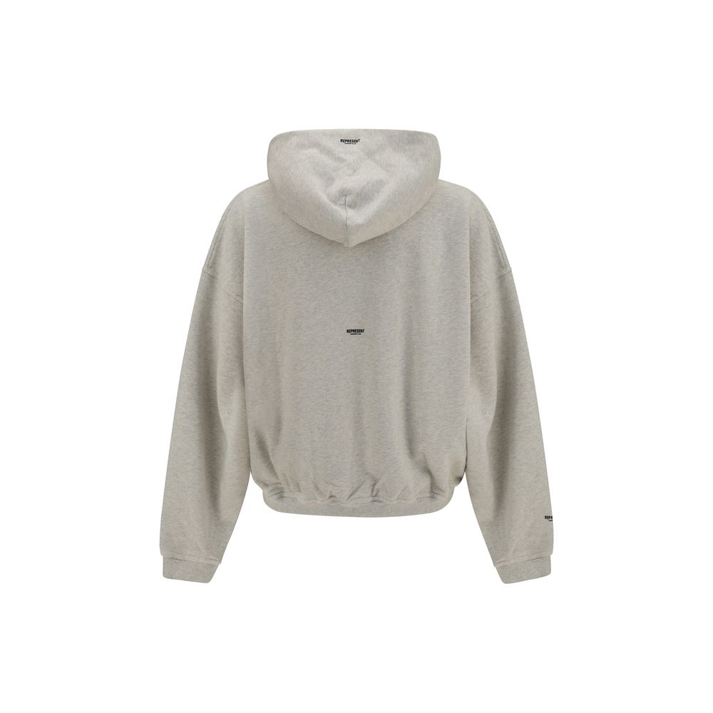 Represent beige cotton sweatshirt with a relaxed fit, featuring a crew neckline and subtle branding on the chest.