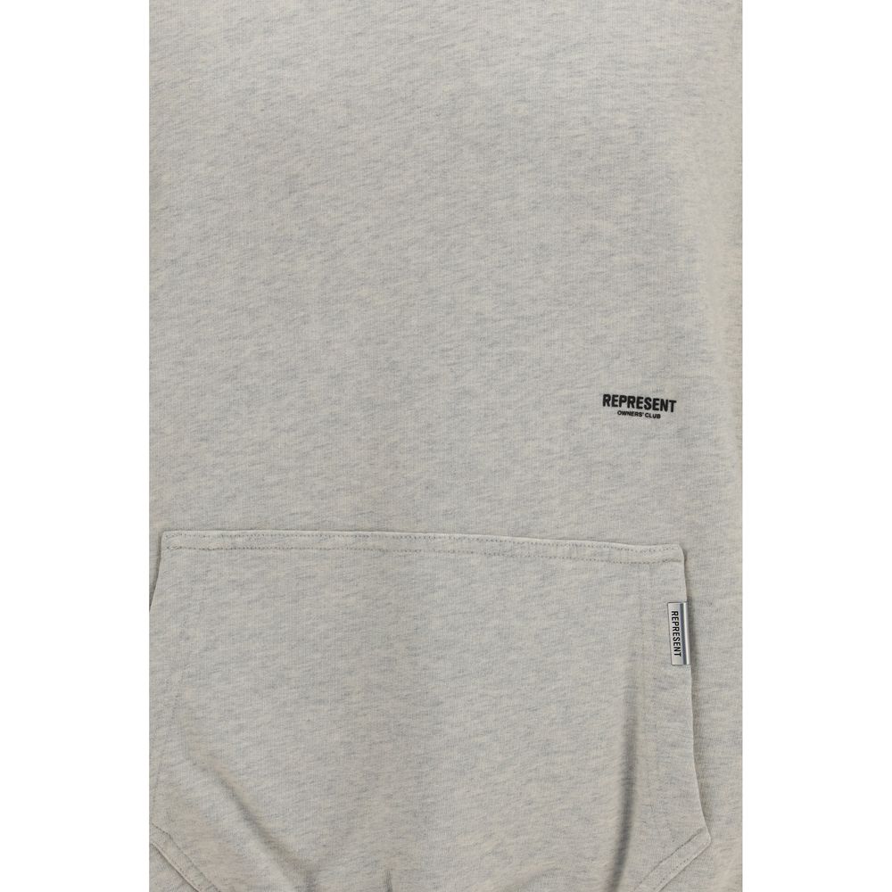 Represent beige cotton sweatshirt with a relaxed fit, featuring a crew neckline and soft fabric for casual comfort.