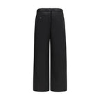Sacai black cotton chino pants with tailored fit and classic design, shown on a neutral background.