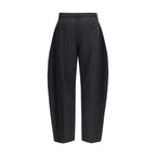 Sacai black polyester casual pants with a relaxed fit, featuring a comfortable waistband and modern design.