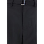 Sacai black polyester casual pants with a relaxed fit, featuring a sleek design and comfortable waistband.