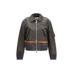 Sacai bicolor nylon bomber jacket with front zipper and ribbed cuffs, featuring contrasting color panels and a sleek, modern design.