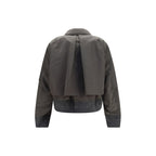 Sacai bicolor nylon bomber jacket with ribbed cuffs and collar, showcasing a sleek and modern design in black and navy.
