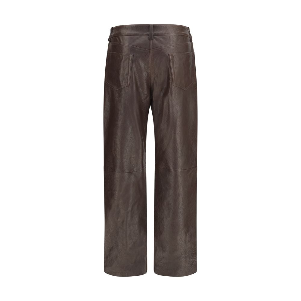 Magda Butrym brown leather pants featuring a slim fit and stylish design, displayed on a neutral background.