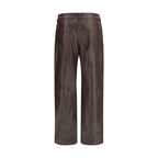 Magda Butrym brown leather pants featuring a slim fit and stylish design, displayed on a neutral background.