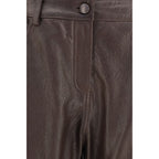 Magda Butrym brown leather pants with a high waist and sleek fit, displayed on a model against a neutral background.