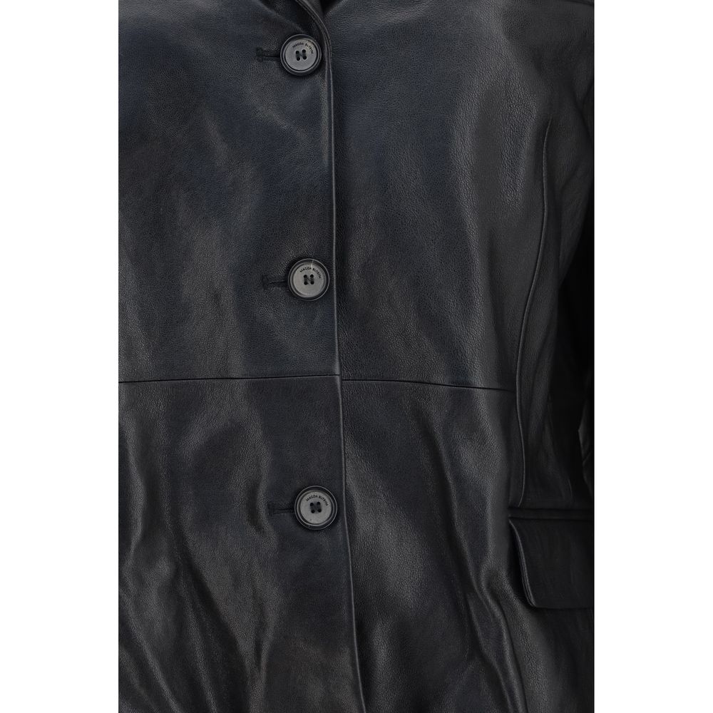 Black lambskin blazer by Magda Butrym, tailored fit with structured design and classic lapels, shown on a model.