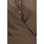 Lemaire brown cotton shirt with a classic collar and button-up front, displayed on a hanger.