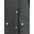 Barbour Bicolor cotton coat showing a stylish, two-tone design with a collar and button closure, perfect for casual outdoor wear.