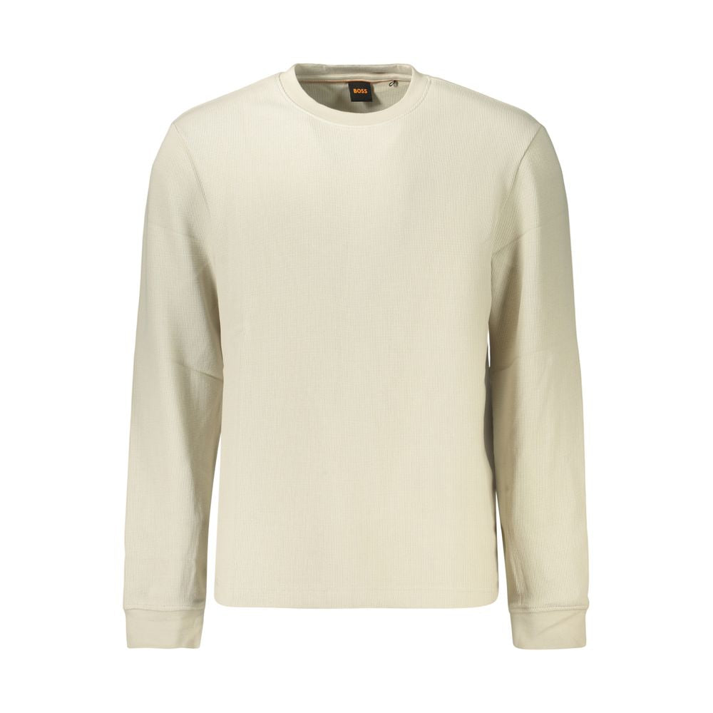 Hugo Boss beige cotton men's shirt displayed on a hanger, showcasing its classic collar and button-front design.