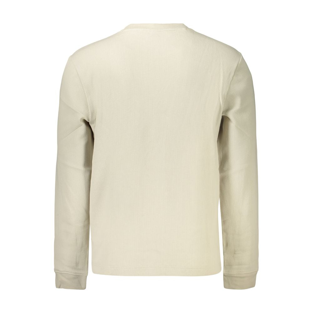 Hugo Boss beige cotton men's shirt with a classic collar and button-down front, displayed on a hanger.