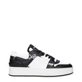 Jimmy Choo black leather low top sneakers with sleek design and white sole, perfect for casual stylish footwear.