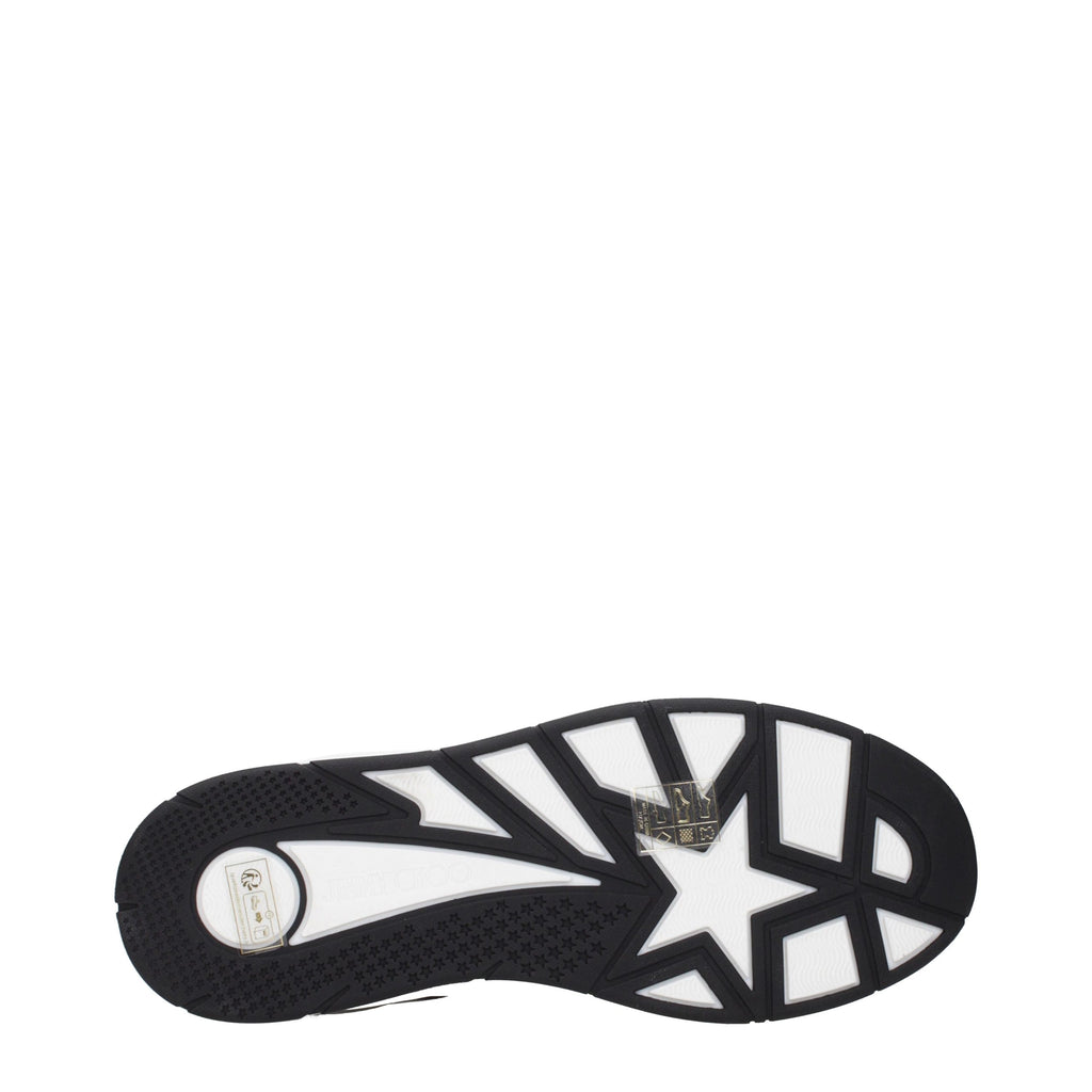 Jimmy Choo black leather low top sneakers with sleek design and white rubber soles.
