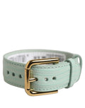 Dolce & Gabbana green textured leather belt strap bracelet with gold buckle and hardware, stylish accessory for men and women.