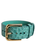 Dolce & Gabbana blue embossed leather belt strap bracelet with gold buckle and decorative embossed design.
