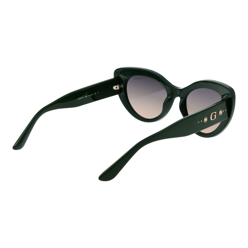 Guess bicolor plastic sunglasses with tinted lenses and bold frame design, perfect for stylish sun protection.