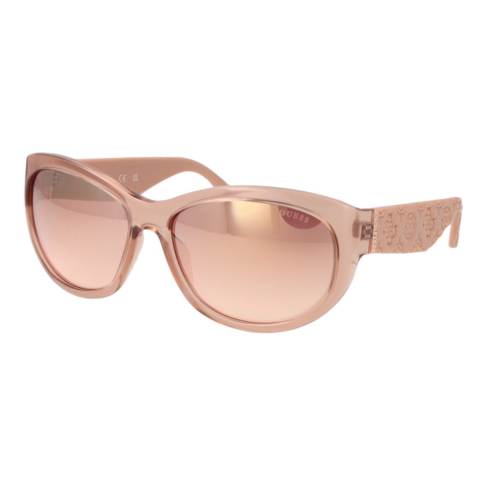 Pink plastic Guess sunglasses with rounded frames and dark lenses, stylish and lightweight for casual wear.