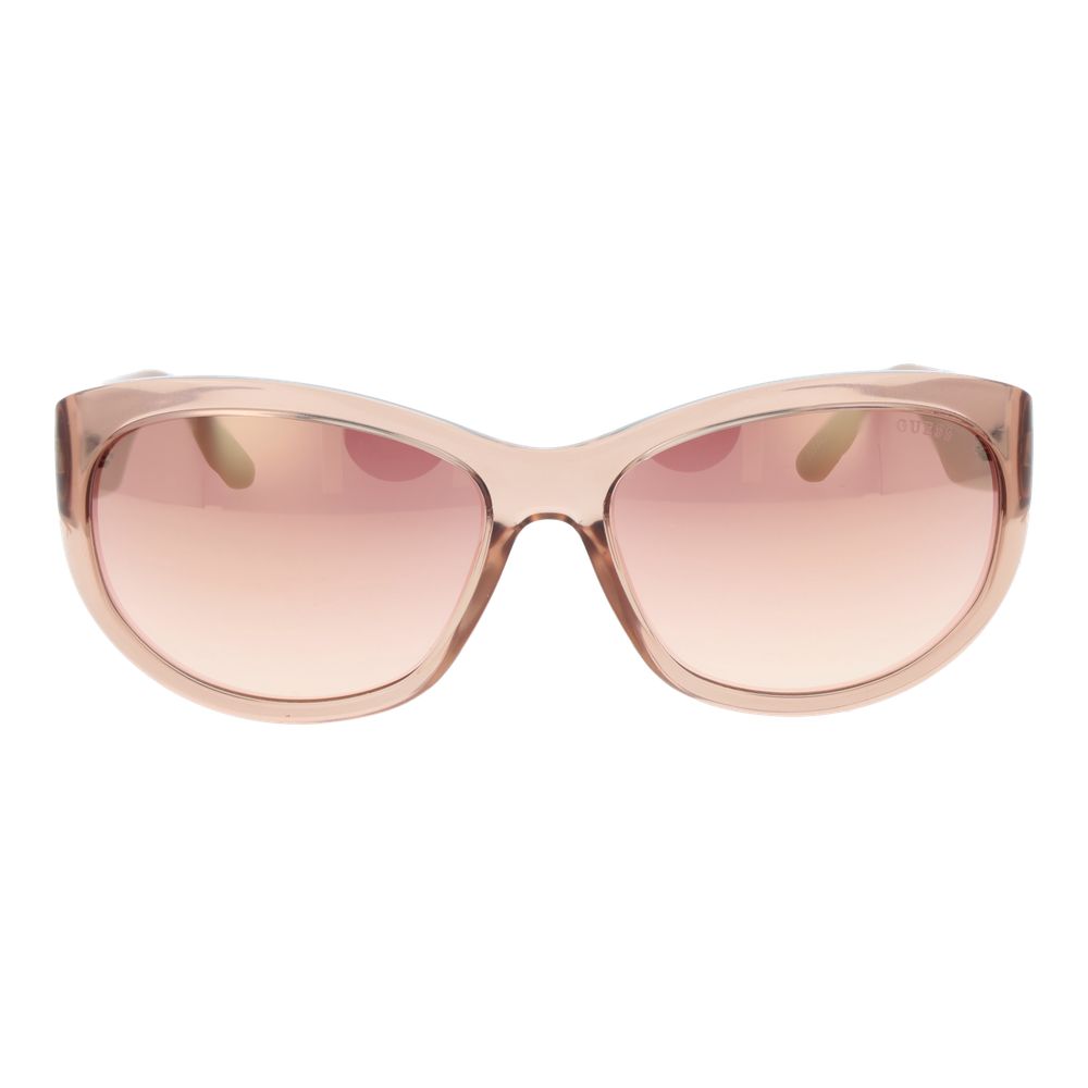 Guess pink plastic sunglasses with rounded frames and tinted lenses, stylish eyewear for a trendy summer look.