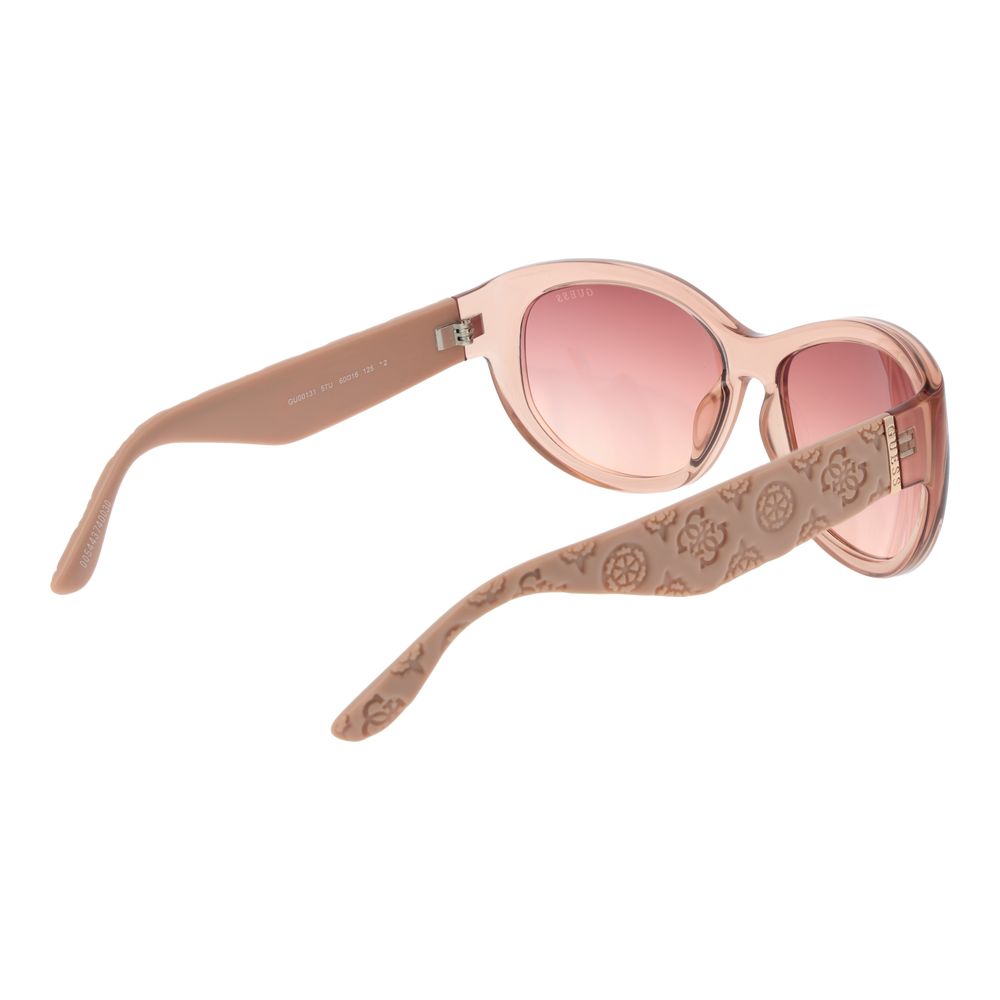 Pink plastic sunglasses by Guess with rounded frames and tinted lenses, stylish and lightweight for casual wear.
