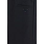 Prada black cotton casual pants with a relaxed fit, featuring a smooth fabric and classic design, suitable for everyday wear.
