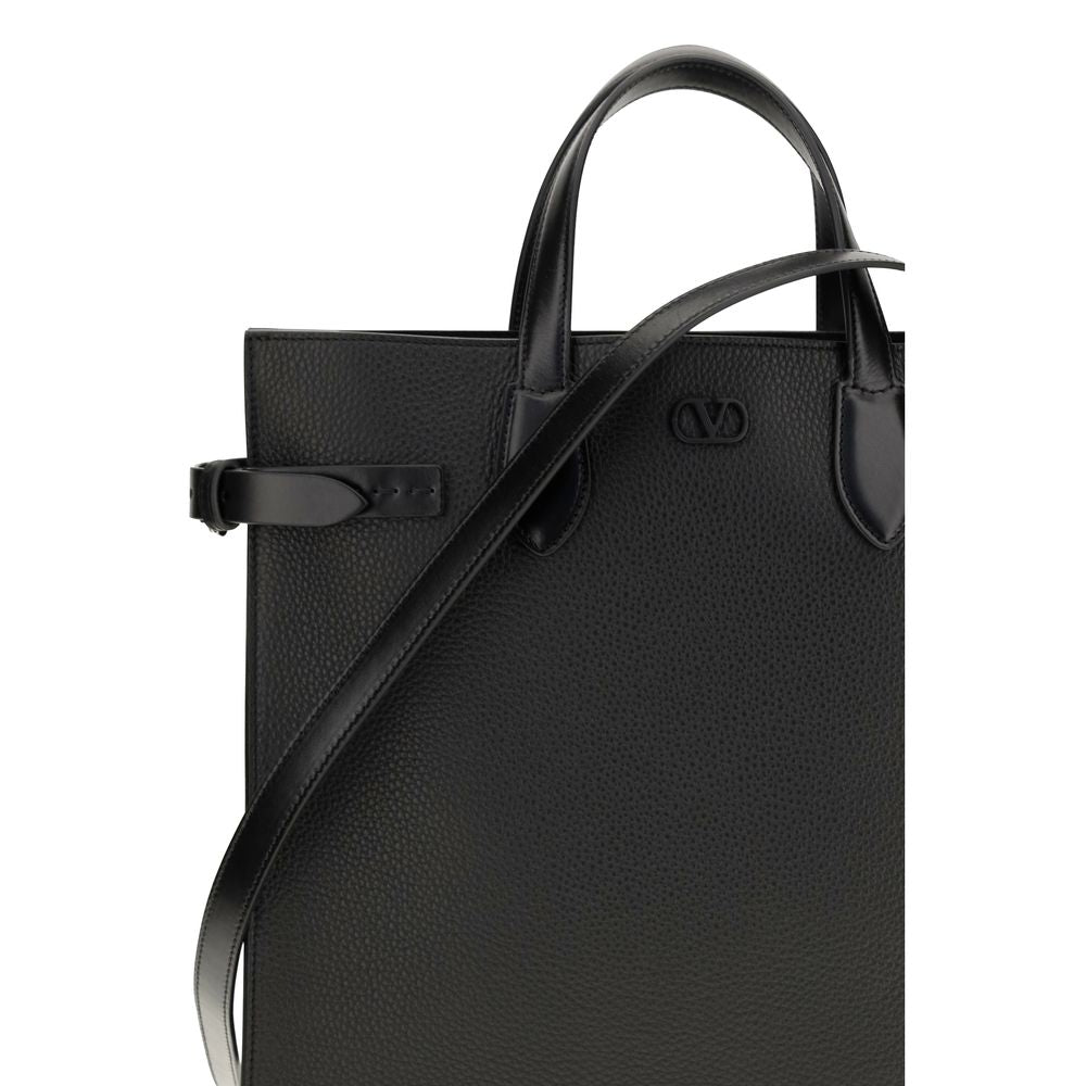 Valentino Garavani black calf leather Bos Taurus shoulder bag with silver hardware and adjustable strap.