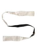 Dolce & Gabbana men's white silk adjustable bow tie with papillon style, showcasing elegant design and fine craftsmanship.