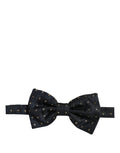 Dark gray silk polka dot bow tie by Dolce & Gabbana, adjustable neck papillon with elegant pattern and classic style.