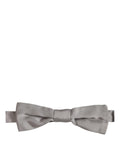 Gray silk adjustable bow tie for men by Dolce & Gabbana, featuring a classic papillon style with elegant detailing.