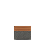 Ferragamo brown calf leather Bos Taurus wallet with sleek design and detailed stitching, showcasing luxurious craftsmanship.