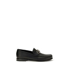 Ferragamo black calf leather Bos Taurus slip-on loafers with sleek design and polished finish for men.