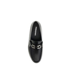 Ferragamo black calf leather Bos Taurus slip-on loafers with sleek design and polished finish.