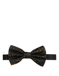 Dark gray speckle pattern Dolce & Gabbana adjustable neck papillon bow tie displayed on a white background.