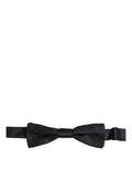 Dark blue Dolce & Gabbana men's silk adjustable bow tie with papillon style, featuring a luxurious and elegant design.