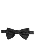 Dolce & Gabbana men's black paisley silk adjustable neck bow tie, stylish and elegant accessory for formal wear.