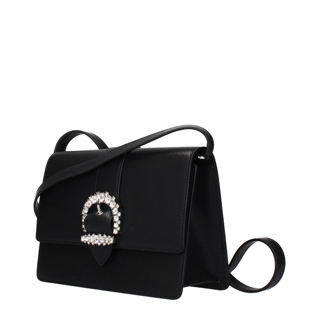 Jimmy Choo black leather crossbody bag with sleek design and adjustable strap, featuring subtle branding and elegant stitching.