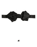 Dolce & Gabbana men's black paisley silk adjustable neck bow tie with papillon style for formal wear.