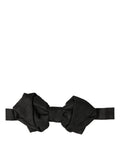 Dolce & Gabbana men’s black silk adjustable neck bow tie with papillon style and elegant knot detail.
