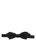 Dolce & Gabbana men's black 100% silk adjustable papillon bow tie with classic design and elegant knot.