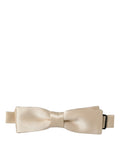 Beige Dolce & Gabbana men's silk adjustable bow tie with papillon design, perfect for formal occasions.