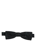 Dolce & Gabbana men's black and green paisley bow tie with adjustable neck strap, stylish and elegant accessory for formal wear.